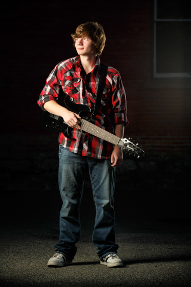 Senior Photo with electric guitar