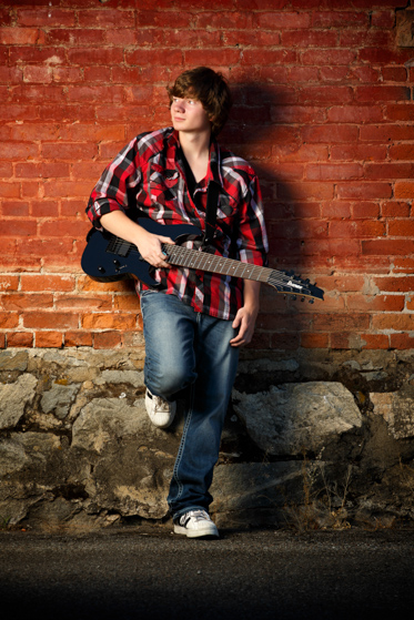 Senior Photo with electric guitar