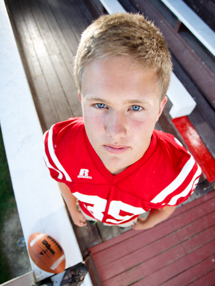 Intentionally goofy portraits called Bobble Head Portraits taken by Jason Duchow with a wide angle lens on a full frame camera.